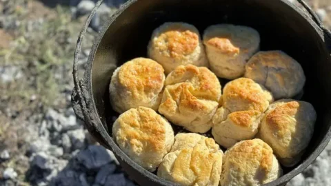 Freshly baked biscuits in a cast iron pot.