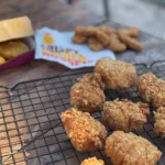 A close up of some food on a grill