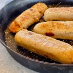 A pan with some sausage in it