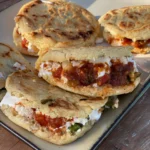 A plate of food with some sandwiches on it