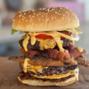 Close-up of a messy, delicious burger.