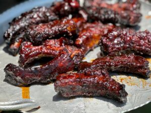 Delicious party ribs covered in caramelized custom sauce by Kent Rollins