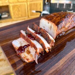 Smoked pork loin with chipotle raspberry sauce