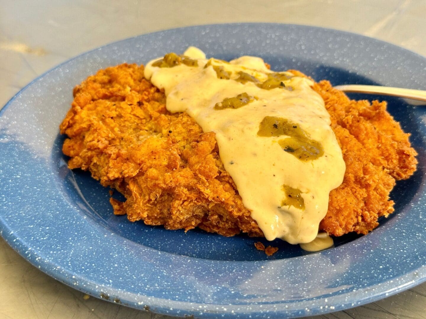 chickenfriedsteakgreenchilefeat Cowboy Kent Rollins Chicken Fried Steak with Green Chile Gravy