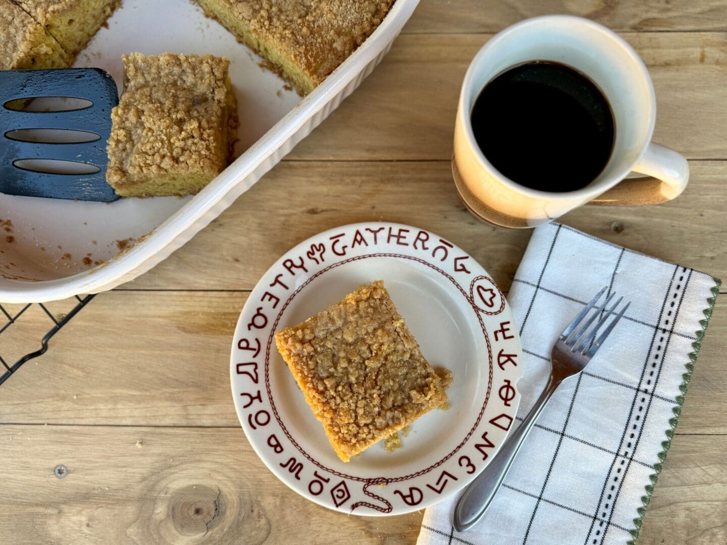 coffee cake feat2 Cowboy Kent Rollins' Coffee and Coffee Cake, next to a linen napkin and a fork