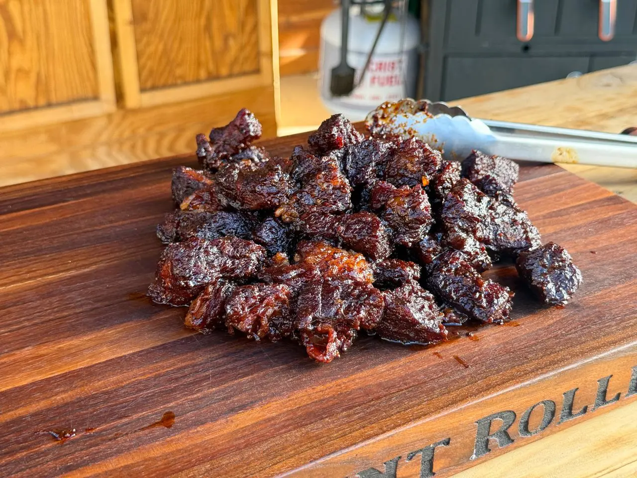 poormansburntendsfeat Cowboy Kent Rollins' Poor Mans Burnt Ends on a wooden cutting board