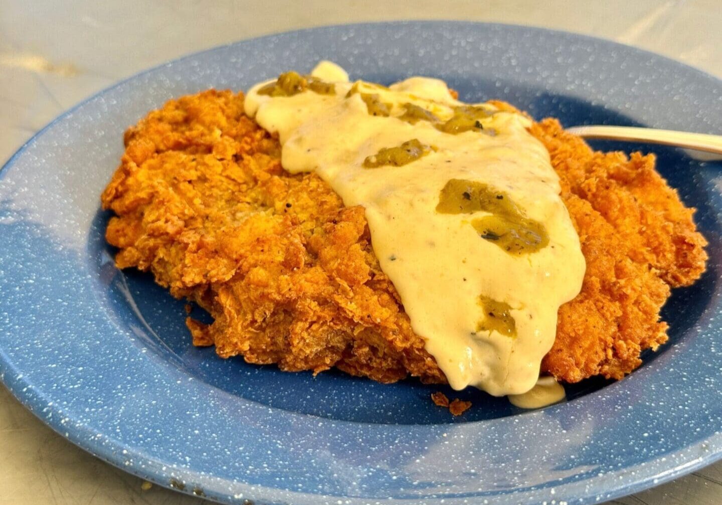 Cowboy Kent Rollins Chicken Fried Steak with Green Chile Gravy