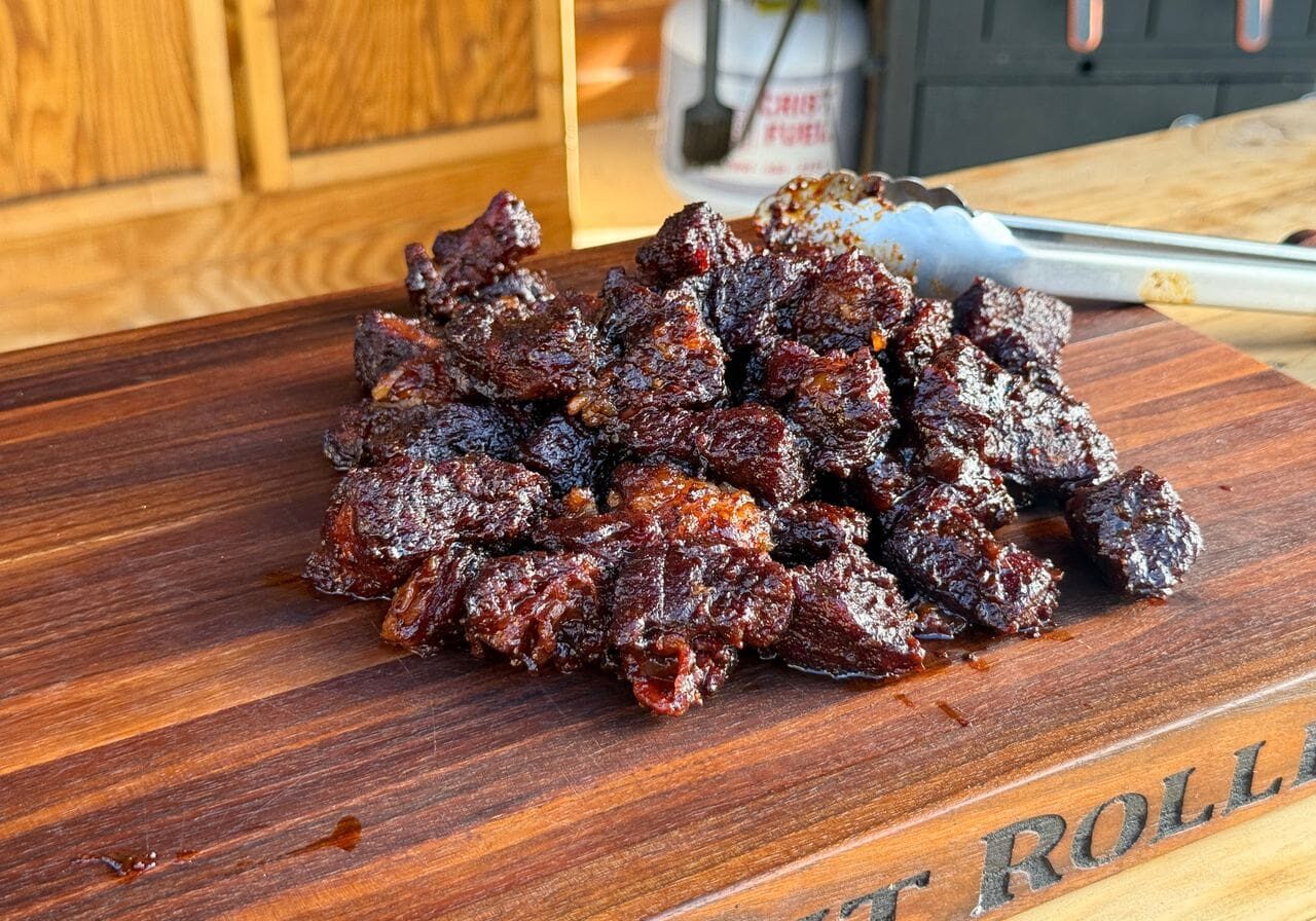 Cowboy Kent Rollins' Poor Mans Burnt Ends on a wooden cutting board